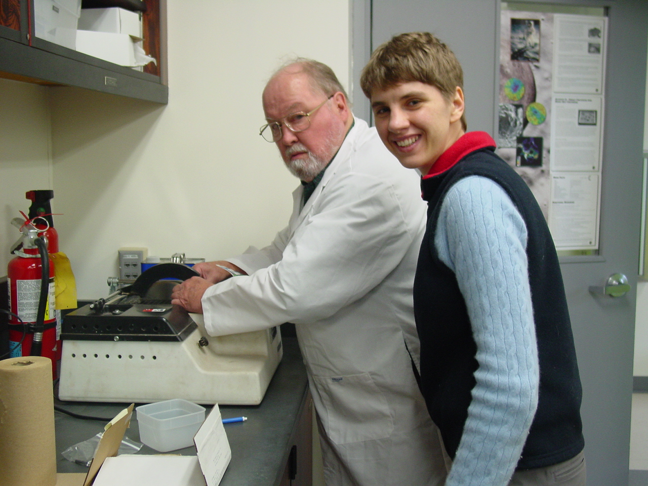 Dick and student Niina cutting samples